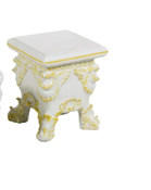 Pair of rectangular yellow-trimmed tabourets decorated with shells and scrollwork