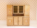 A Pencil Rattan Hutch with Glass Doors and Painted Inset Ceramic Tiles