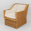 A Pair of Rattan Club Chairs in the Style of Michael Taylor