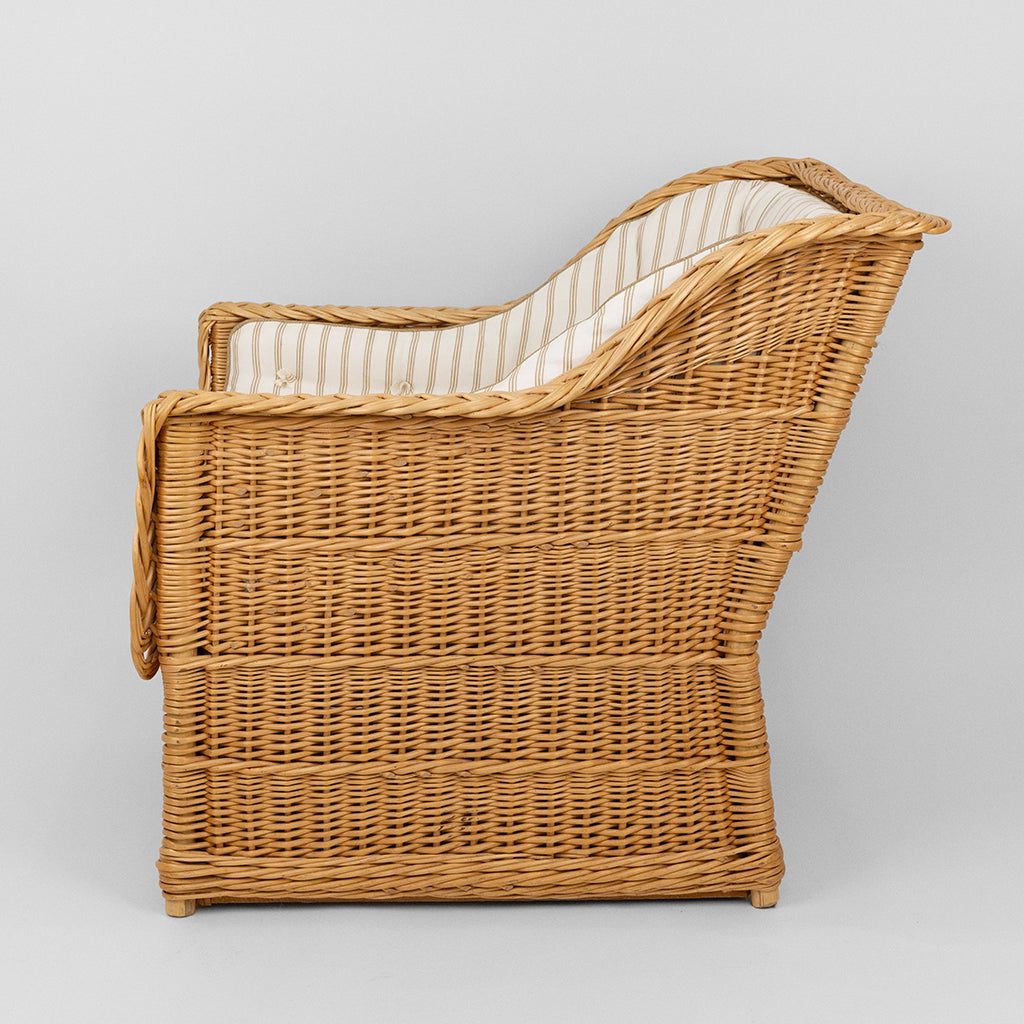 A Pair of Rattan Club Chairs in the Style of Michael Taylor