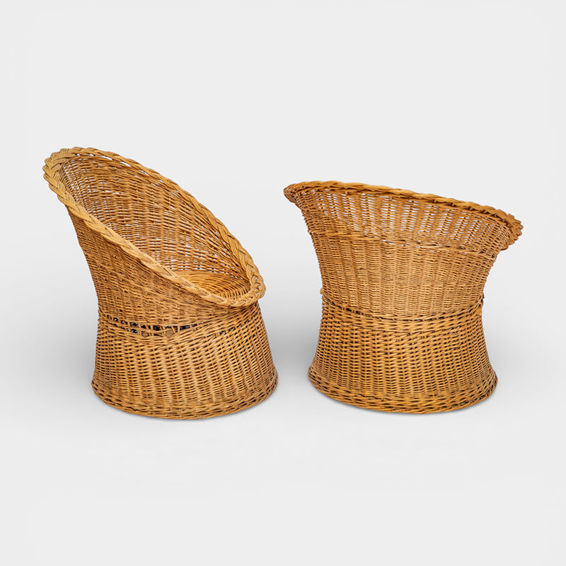 A Pair of Rounded Rattan Chairs with Braided Edges