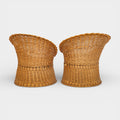 A Pair of Rounded Rattan Chairs with Braided Edges
