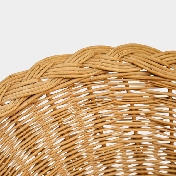 A Pair of Rounded Rattan Chairs with Braided Edges