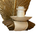 A Pair of Lacquer Painted and Gilded Brass Leaf Sconces