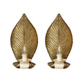 A Pair of Lacquer Painted and Gilded Brass Leaf Sconces