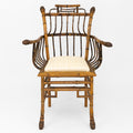 A Pair of Chinese Export Faux Bamboo Arm Chairs