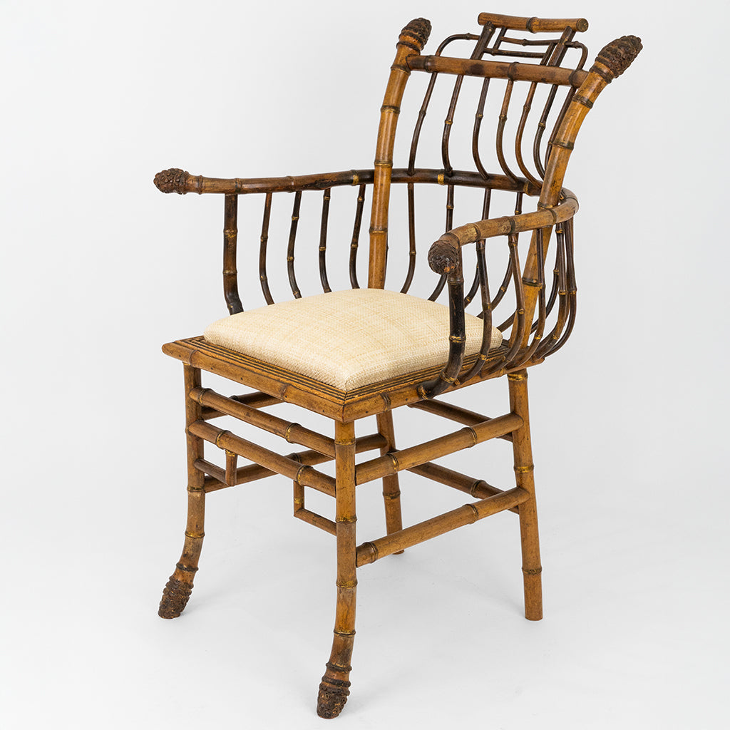 A Pair of Chinese Export Faux Bamboo Arm Chairs