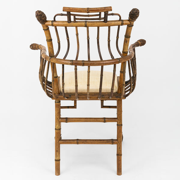 A Pair of Chinese Export Faux Bamboo Arm Chairs