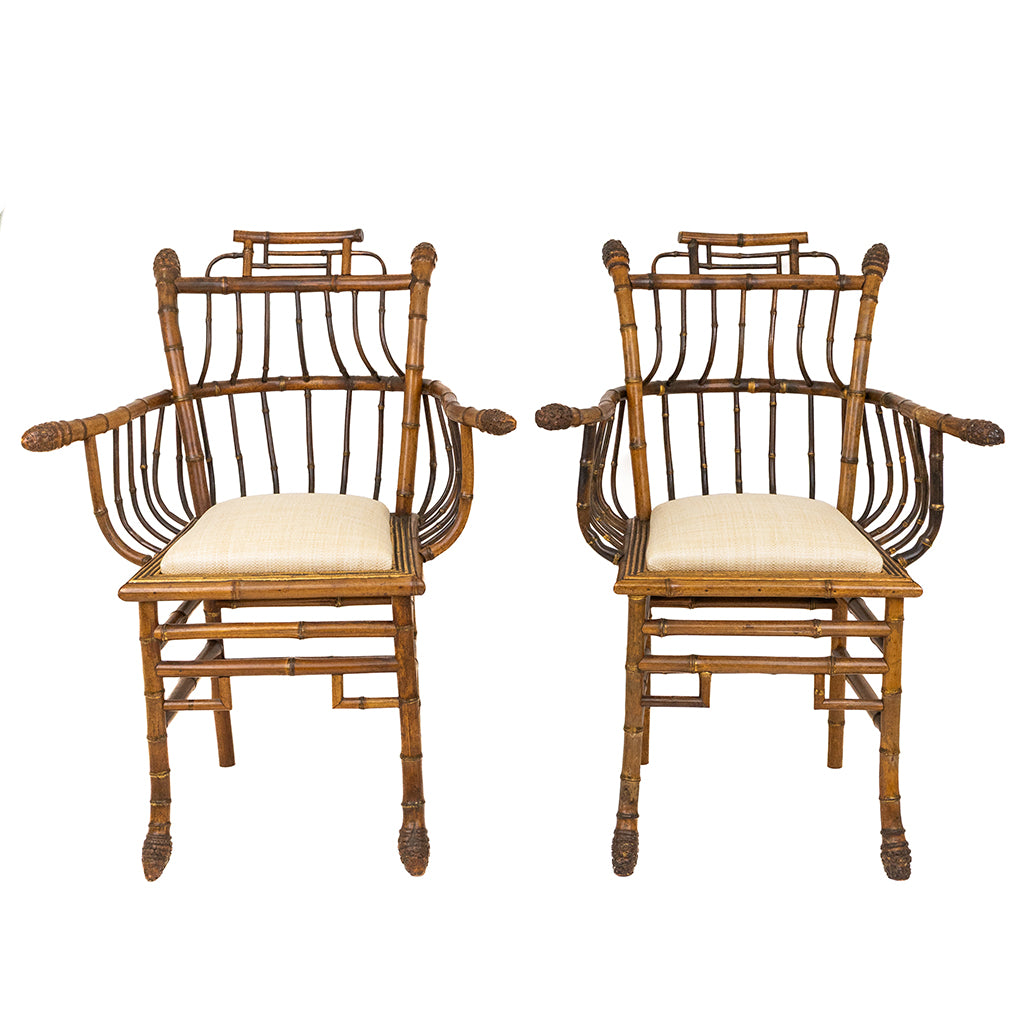 A Pair of Chinese Export Faux Bamboo Arm Chairs