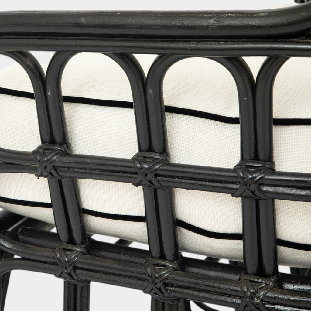 A Pair of High Back Rattan Wing Chairs