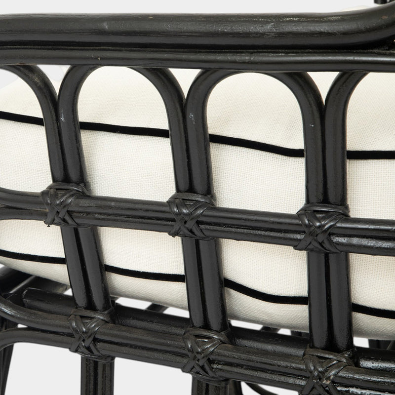 A Pair of High Back Rattan Wing Chairs