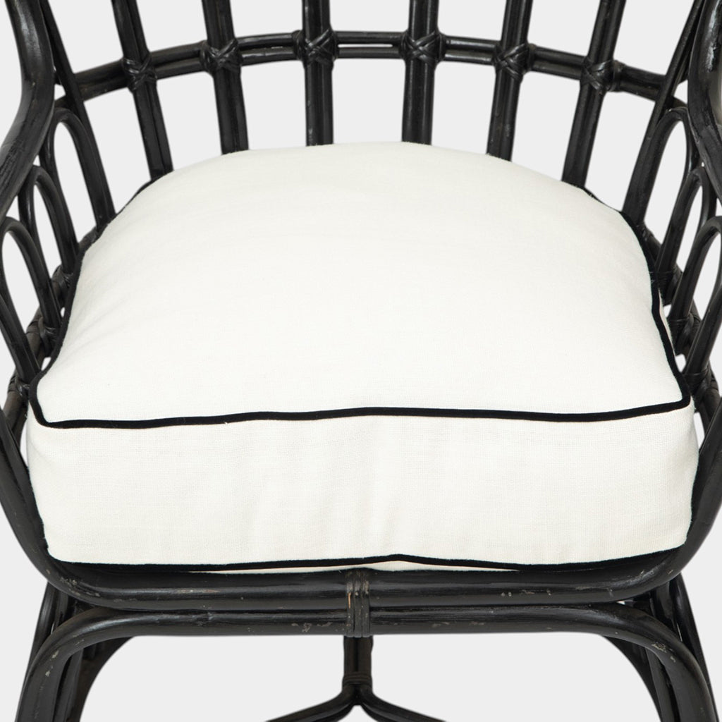 A Pair of High Back Rattan Wing Chairs