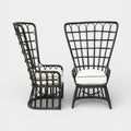 A Pair of High Back Rattan Wing Chairs