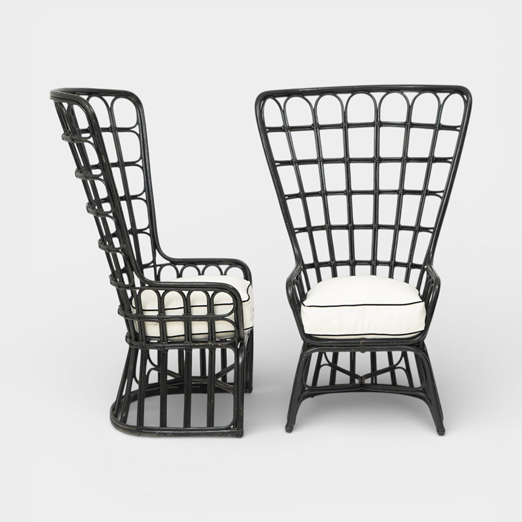 A Pair of High Back Rattan Wing Chairs