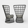 A Pair of High Back Rattan Wing Chairs