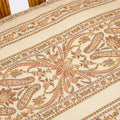 A Vintage French Rattan Sofa with Scroll Detail