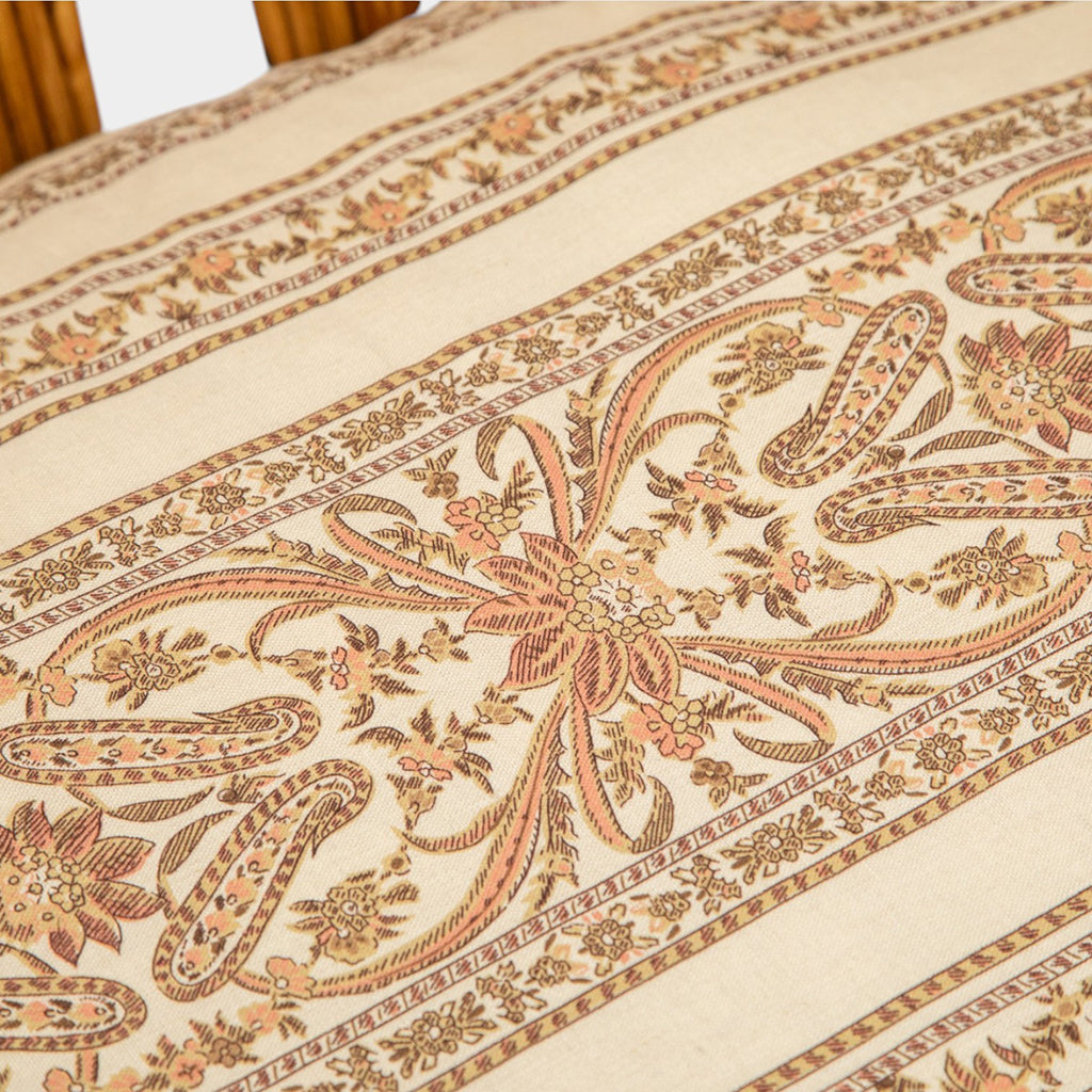 A Vintage French Rattan Sofa with Scroll Detail