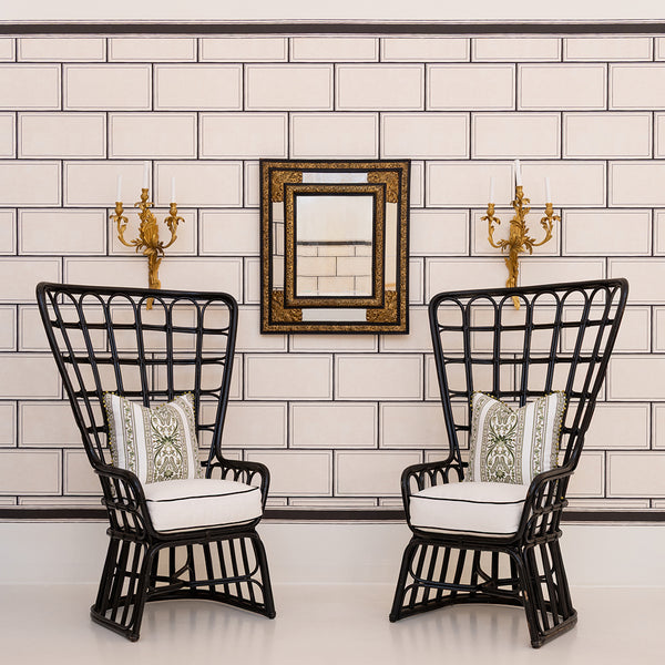A Pair of High Back Rattan Wing Chairs