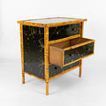 A Bamboo and Black Lacquered Chest with Hand Painted Floral Decor
