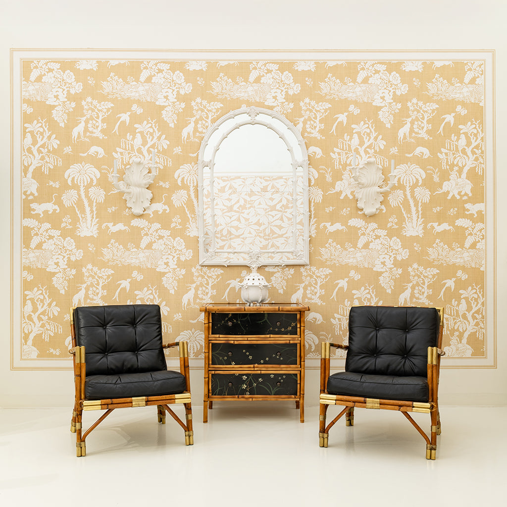 A Bamboo and Black Lacquered Chest with Hand Painted Floral Decor