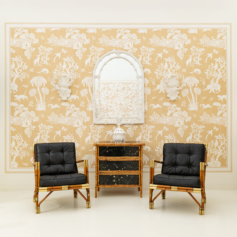 A Bamboo and Black Lacquered Chest with Hand Painted Floral Decor