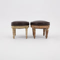 A Near Pair of Antique Louis XVI Oval Footstools