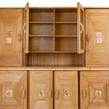 A Pencil Rattan Hutch with Glass Doors and Painted Inset Ceramic Tiles