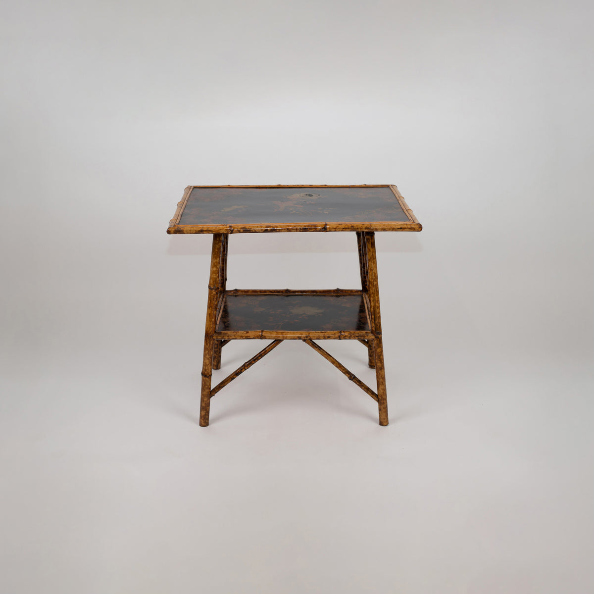 A Chinoiserie Decorated Bamboo Side Table in the manner of Jean-Baptiste Kohn