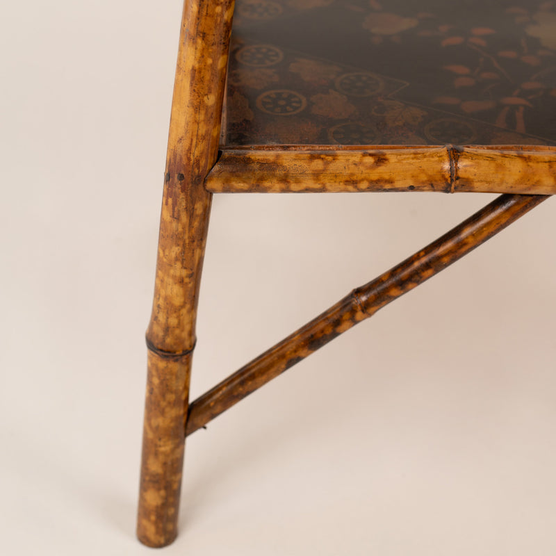 A Chinoiserie Decorated Bamboo Side Table in the manner of Jean-Baptiste Kohn