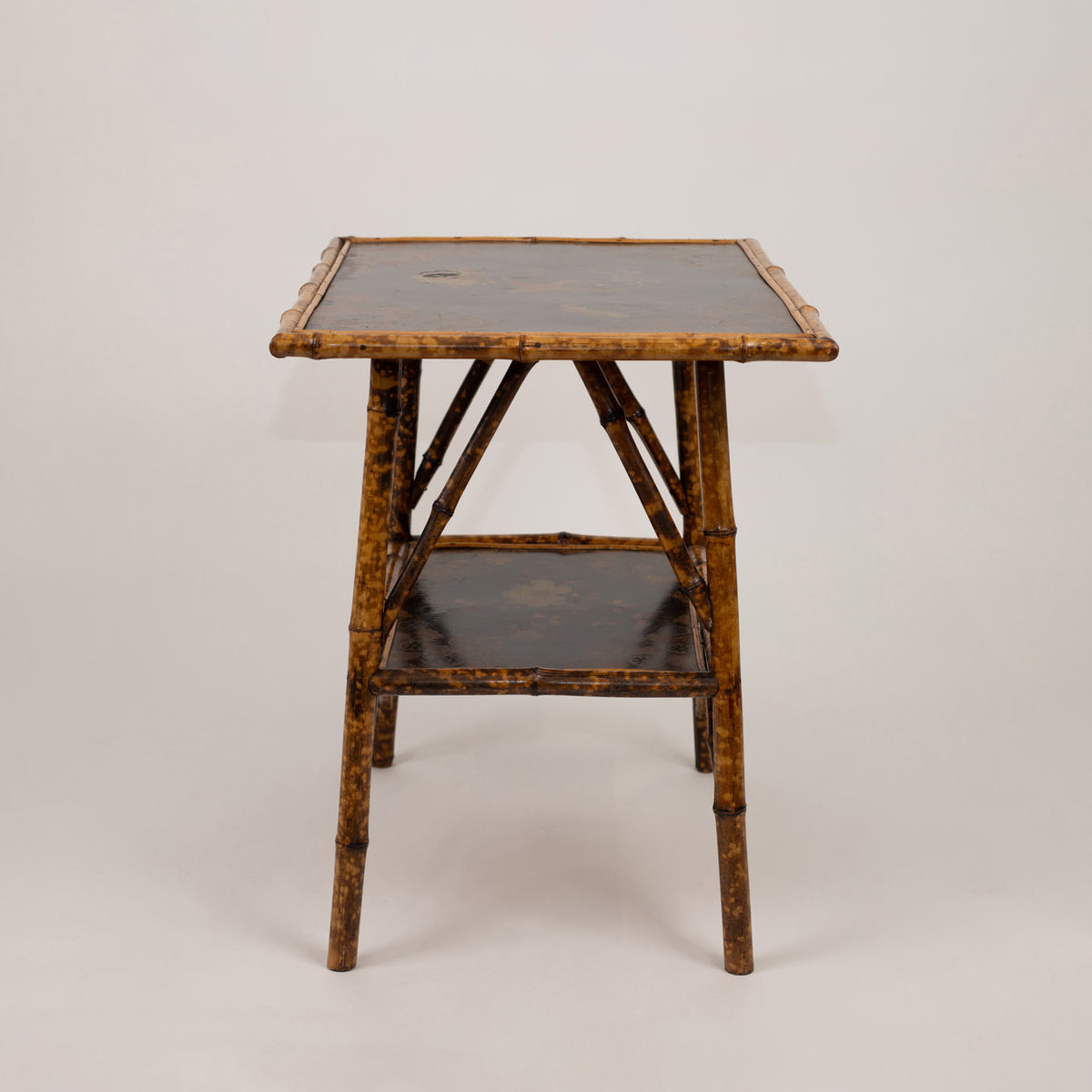 A Chinoiserie Decorated Bamboo Side Table in the manner of Jean-Baptiste Kohn