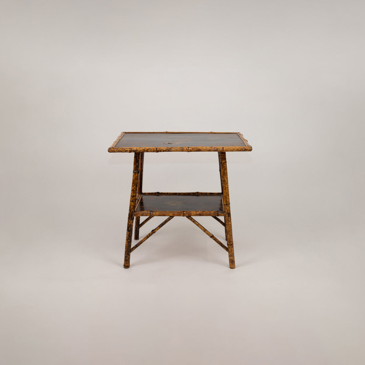 A Chinoiserie Decorated Bamboo Side Table in the manner of Jean-Baptiste Kohn