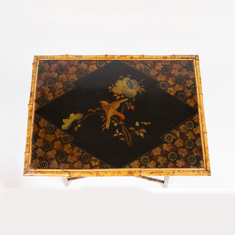 A Chinoiserie Decorated Bamboo Side Table in the manner of Jean-Baptiste Kohn