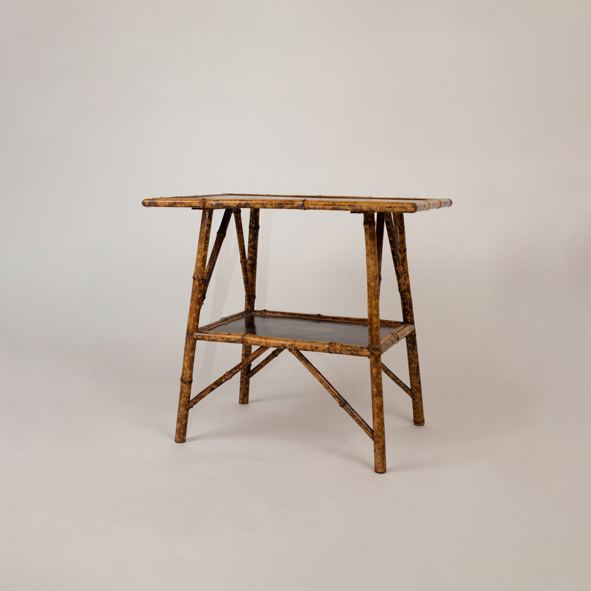 A Chinoiserie Decorated Bamboo Side Table in the manner of Jean-Baptiste Kohn