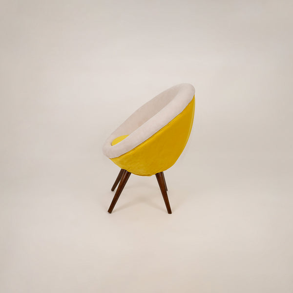 A Pair of Mid-Century Upholstered Bucket Chairs