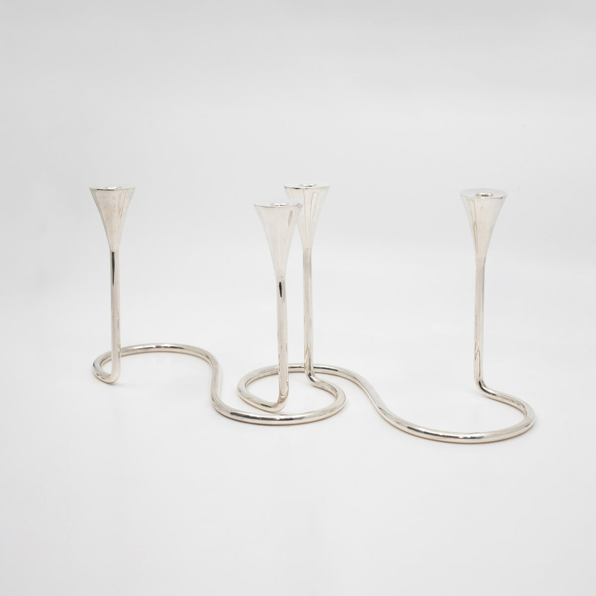 A Pair of Sterling Silver Modern Candelabras