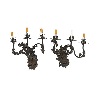 A Pair of French Wrought Iron Three-Arm Sconces