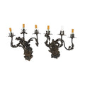 A Pair of French Wrought Iron Three-Arm Sconces