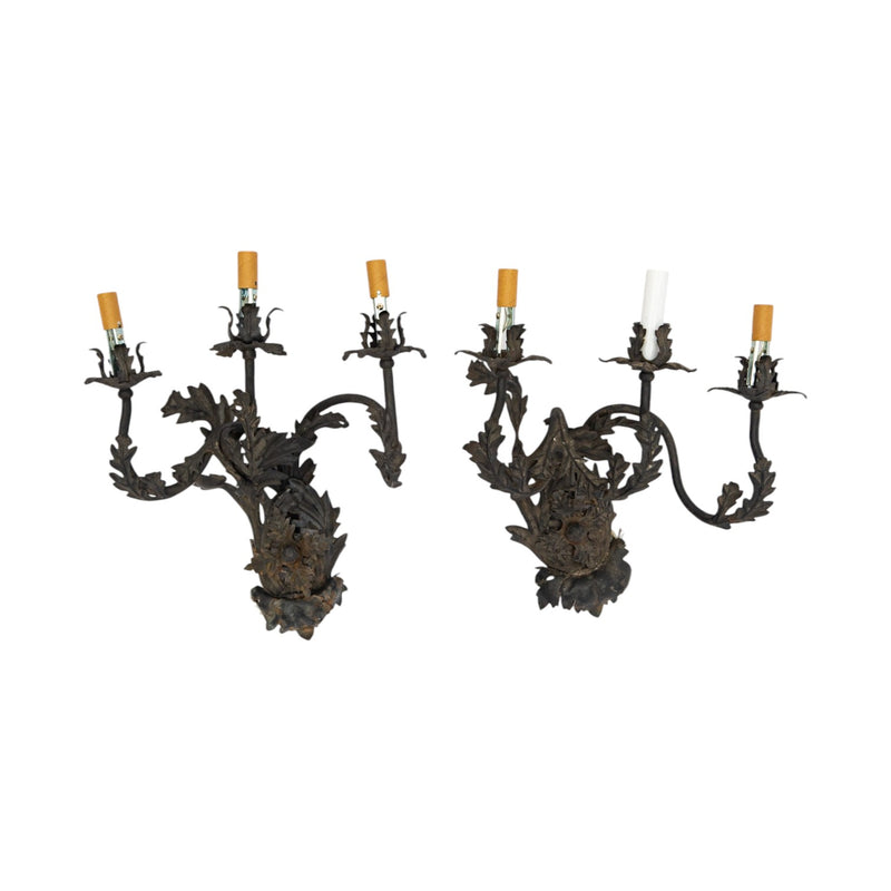 A Pair of French Wrought Iron Three-Arm Sconces