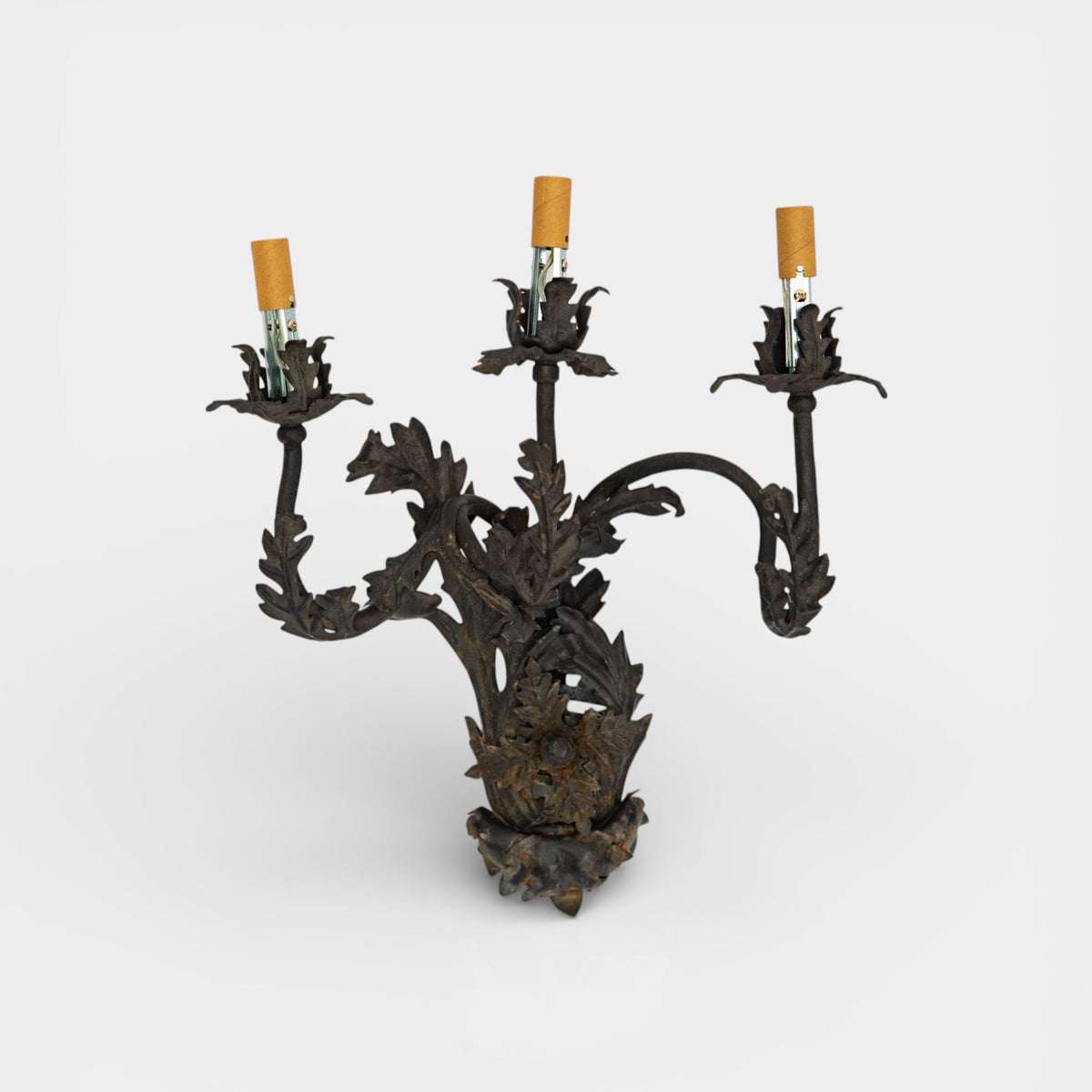 A Pair of French Wrought Iron Three-Arm Sconces