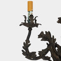 A Pair of French Wrought Iron Three-Arm Sconces
