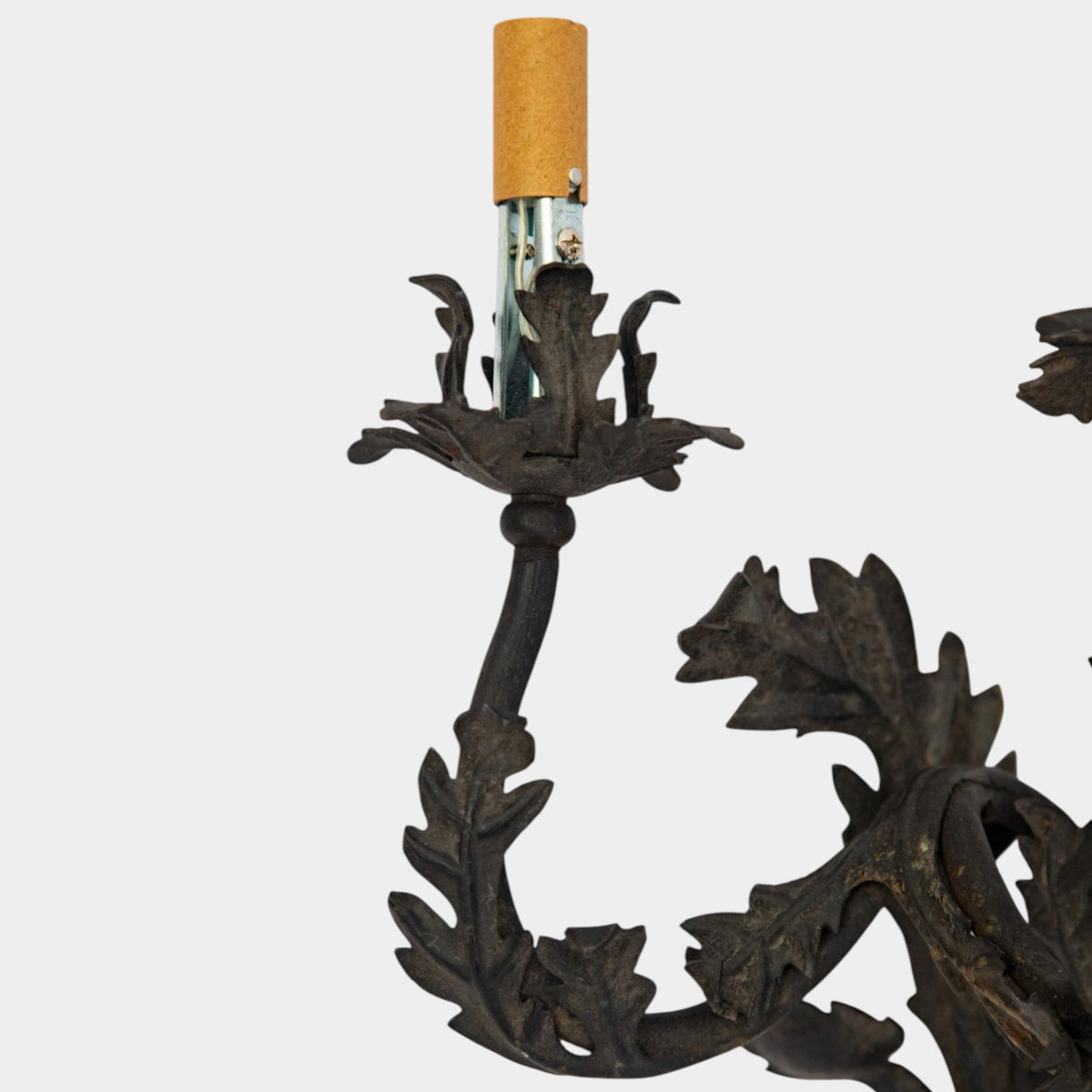 A Pair of French Wrought Iron Three-Arm Sconces