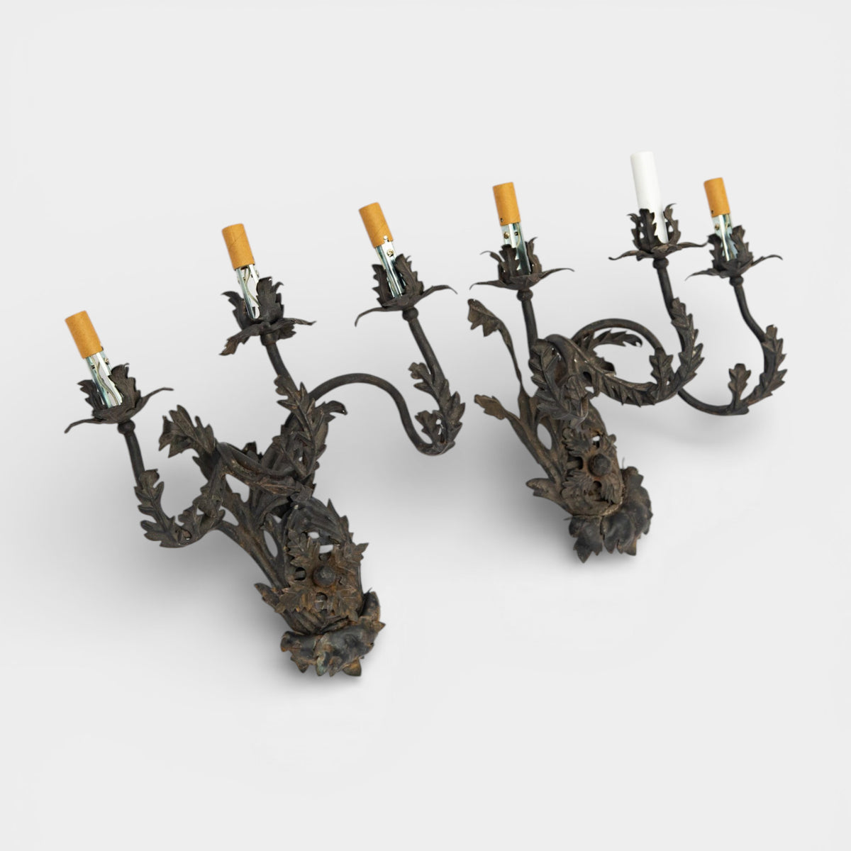A Pair of French Wrought Iron Three-Arm Sconces
