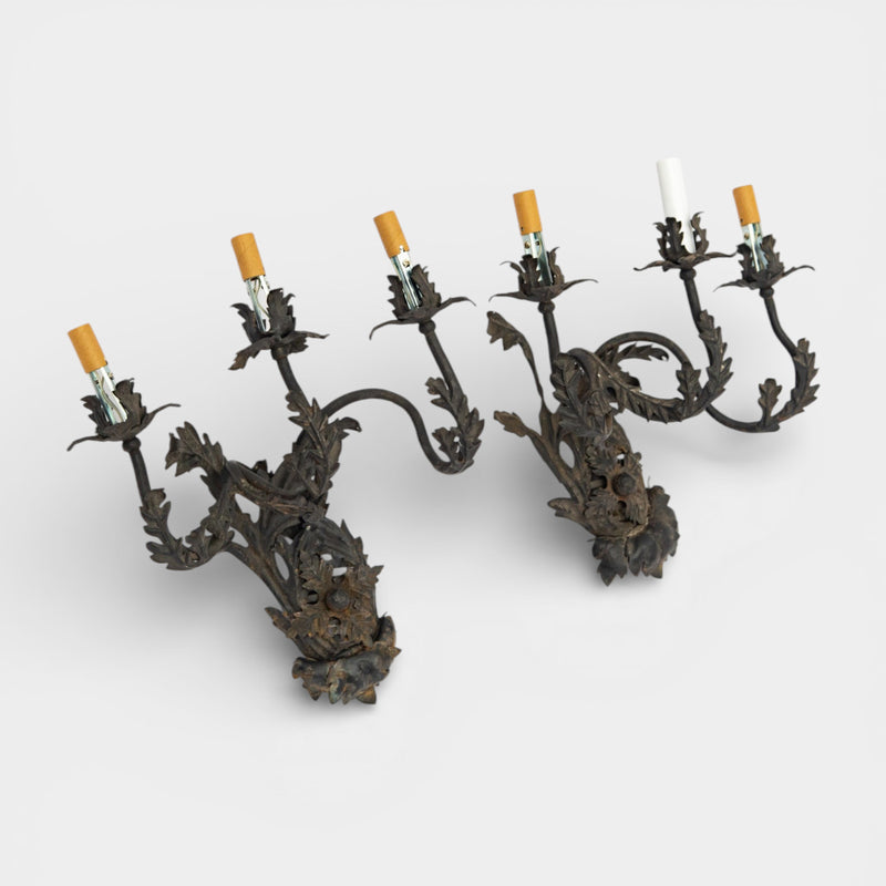 A Pair of French Wrought Iron Three-Arm Sconces