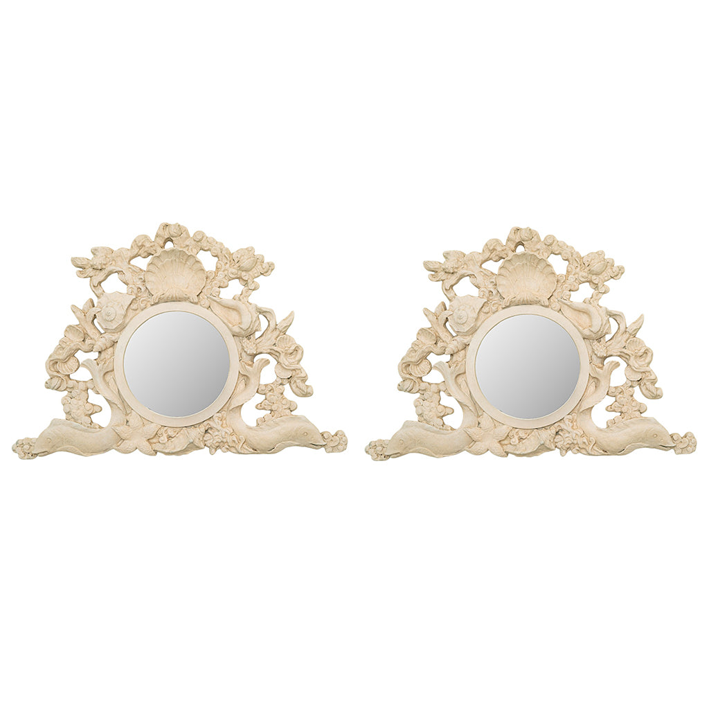 A Pair of Rococo Style Shell Form Mirrors