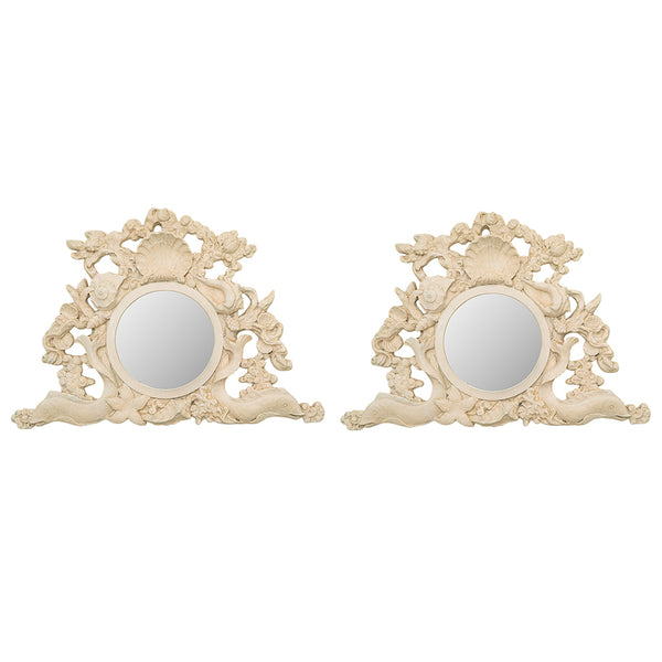 A Pair of Rococo Style Shell Form Mirrors