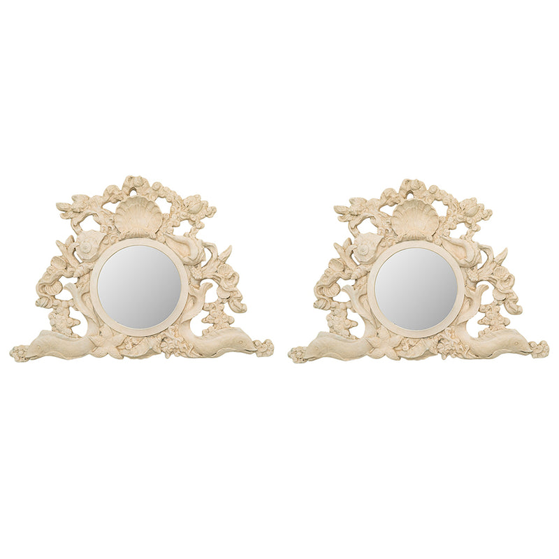 A Pair of Rococo Style Shell Form Mirrors