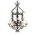 A Brass and Wrought Iron Chandelier with Painted Ceramic Flowers
