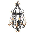 A Brass and Wrought Iron Chandelier with Painted Ceramic Flowers