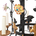 A Brass and Wrought Iron Chandelier with Painted Ceramic Flowers