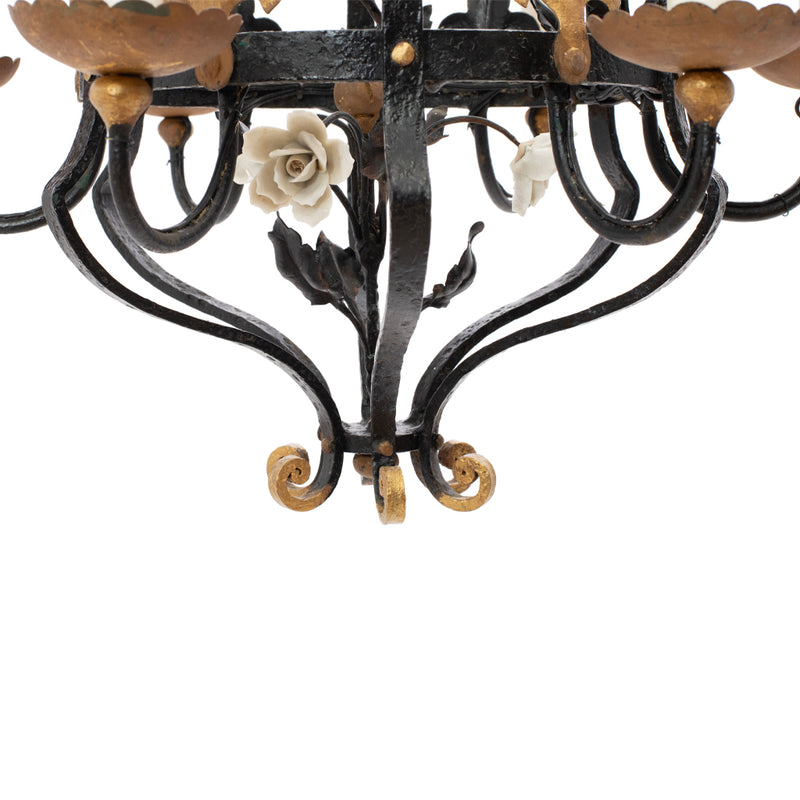 A Brass and Wrought Iron Chandelier with Painted Ceramic Flowers